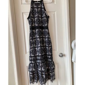 Fitted black and white lace dress